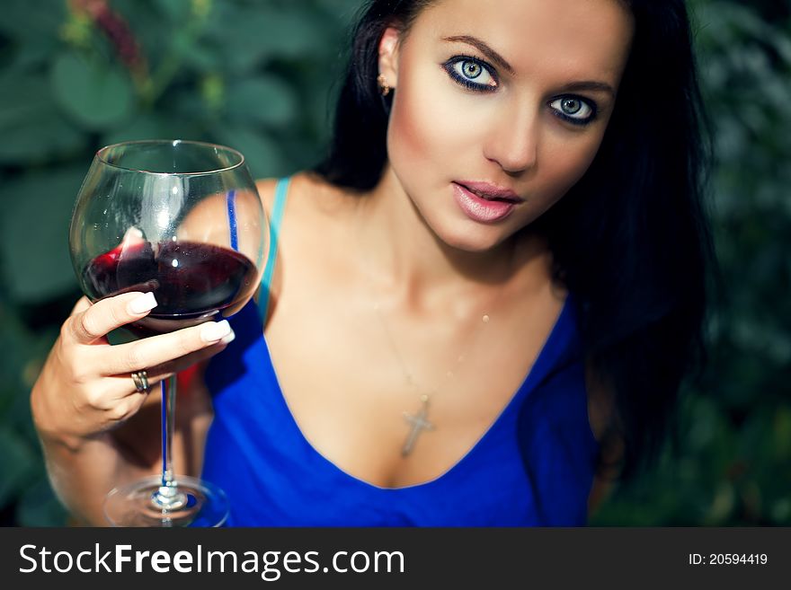 Beautiful Young Girl Drinkink Wine