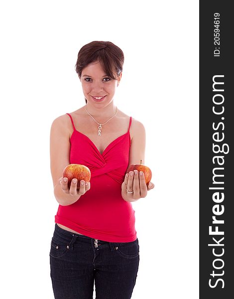 The young woman holding apple in her hand. The young woman holding apple in her hand