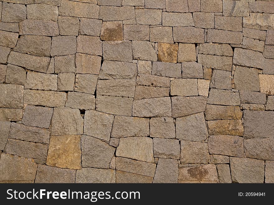 Wall made out of chiseled stacked stones. Wall made out of chiseled stacked stones