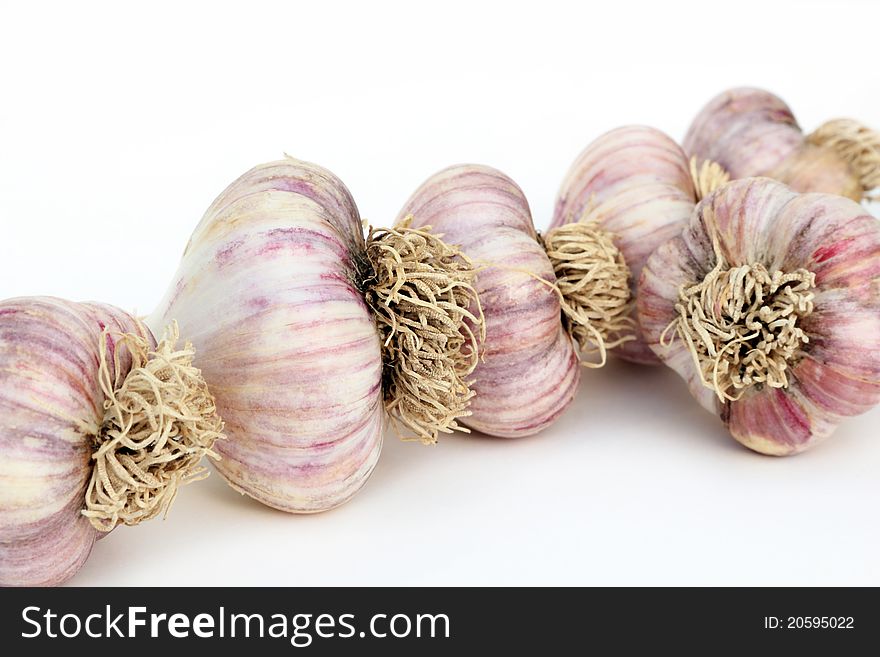 Several garlic bulbs close up
