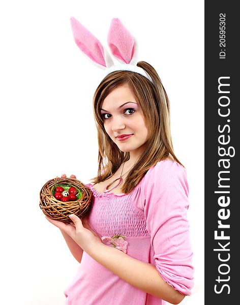 Easter bunny female with easter eggs in her hand - isolated