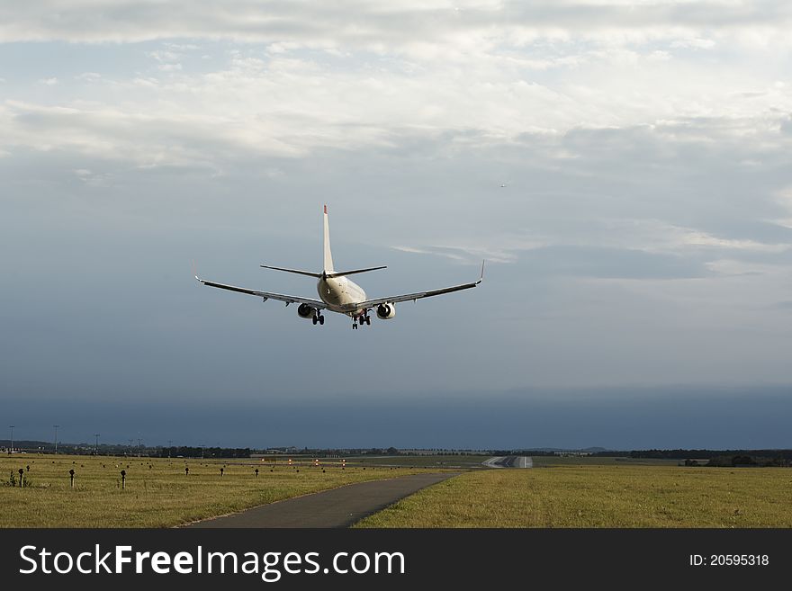 Airplane is landing in Prague International Airport, the Czech Republic.
