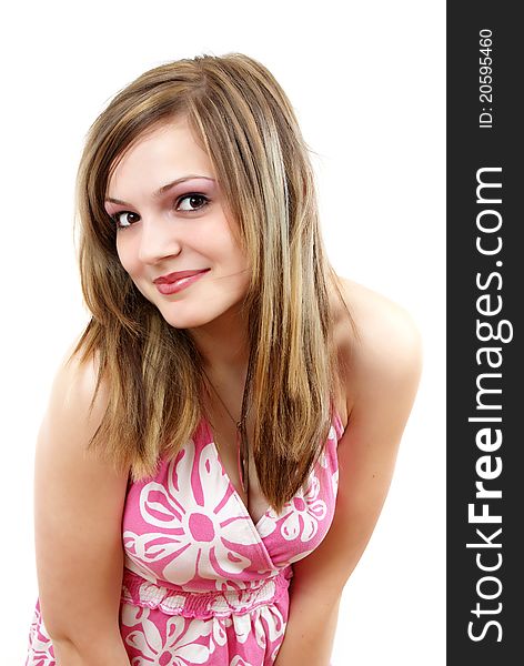 Portrait of a happy young woman posing against white background