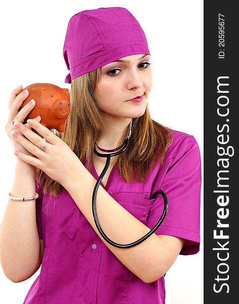 Young nurse with piggy bank