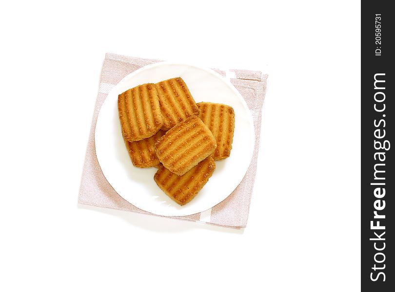 Cookies on white plate isolated on white background