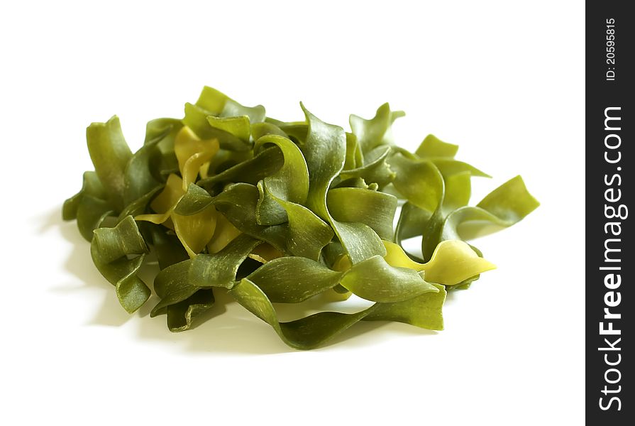 Green pasta isolated on white background