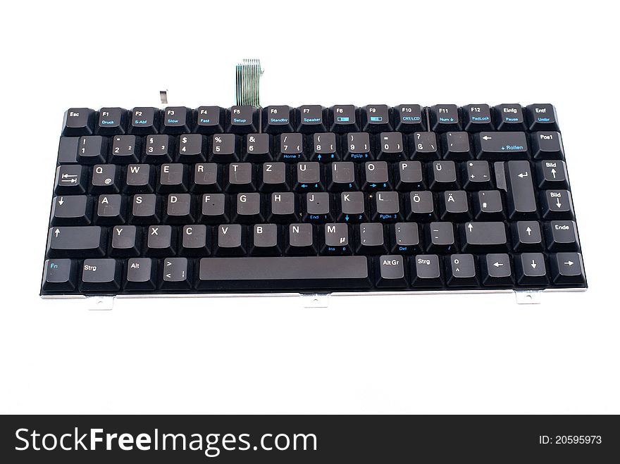 Old laptop keyboard isolated on white