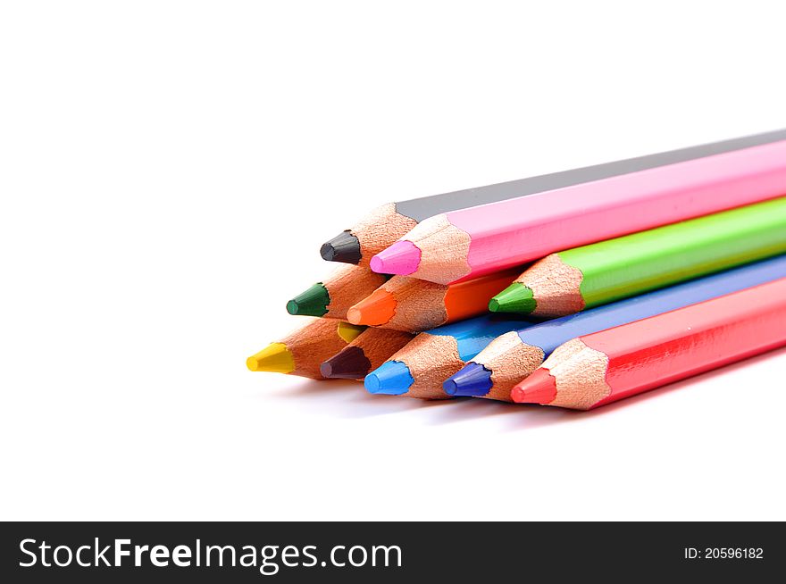 Various color pencils isolated on the white