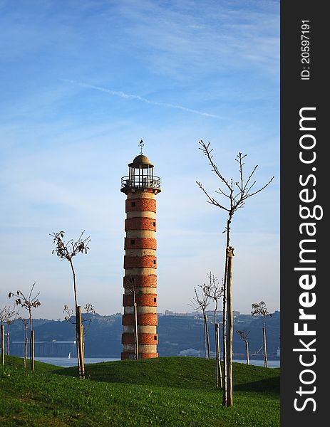 Old lighthouse along the river Tagus, near the monument to the Discoveries, Lisbon, district of BelÃ©m, Portugal. Old lighthouse along the river Tagus, near the monument to the Discoveries, Lisbon, district of BelÃ©m, Portugal