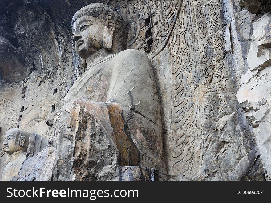 Closeup shot of a Buddha at Longmen Grottoes, Luoyang, China. Closeup shot of a Buddha at Longmen Grottoes, Luoyang, China