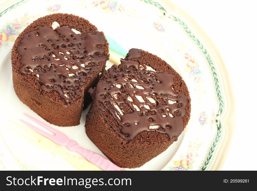Cake chocolate roll on dish