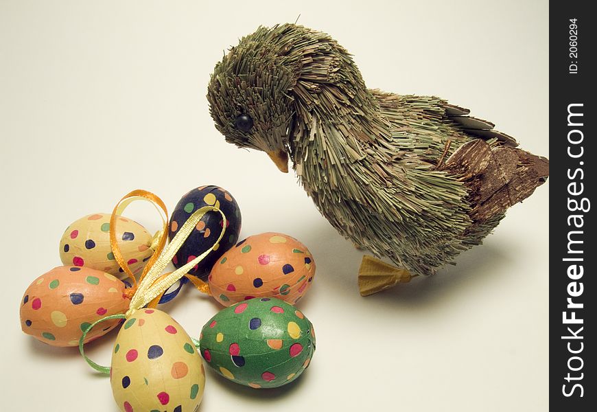 Colorful easter eggs and a duck to welcome Ester time. Colorful easter eggs and a duck to welcome Ester time