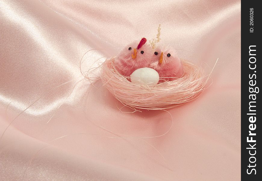 Sweet pink chicks in the nest for a pink Easter