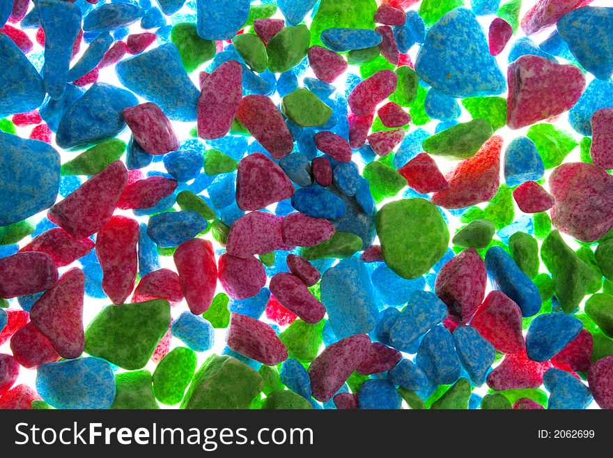 Multicolored background of painted gravel. Multicolored background of painted gravel