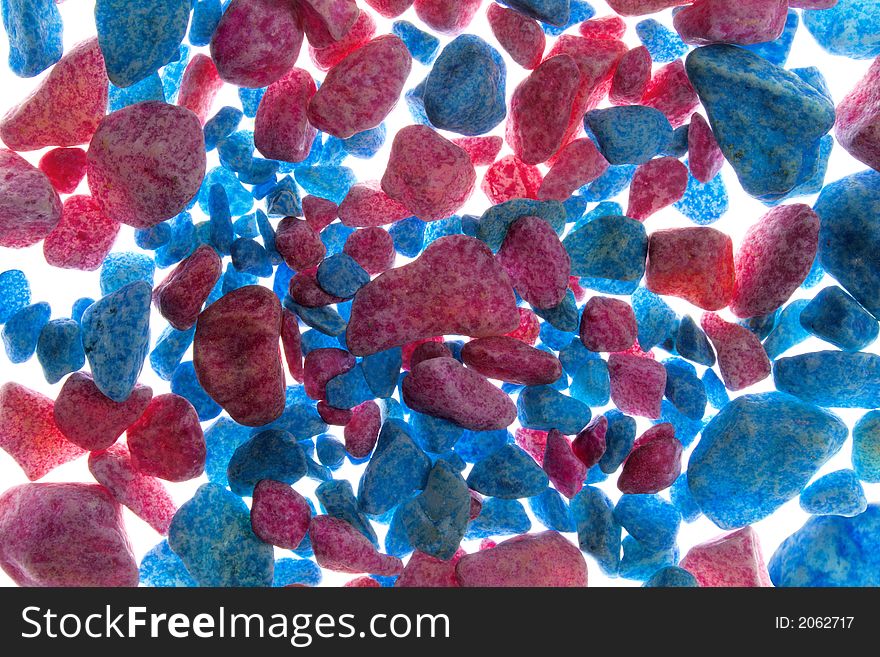 Red-blue background of a painted gravel. Red-blue background of a painted gravel