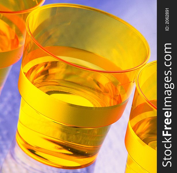 Three Plastic Disposable Glasses With Water