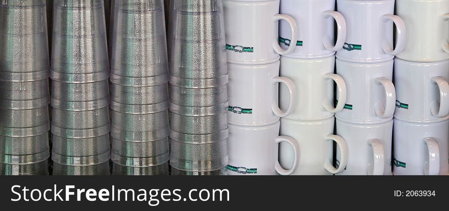 Rows and stacks of water and coffee cups