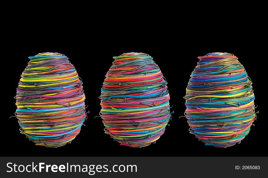 Three eggs on black background