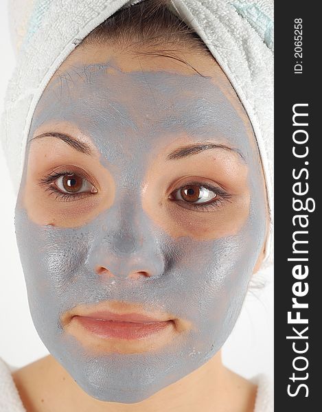 Attractive woman with facial mask. Attractive woman with facial mask