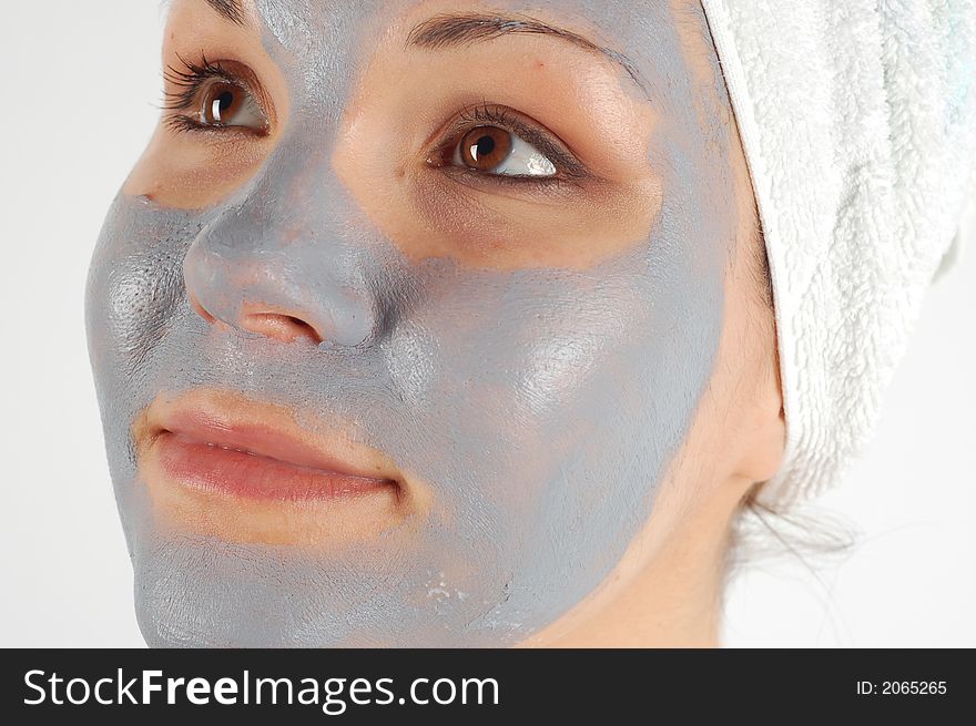 Attractive woman with facial mask. Attractive woman with facial mask