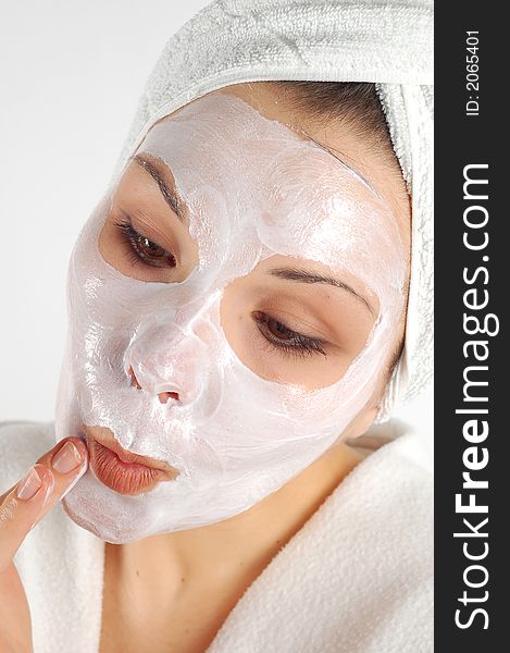 Attractive woman with facial mask. Attractive woman with facial mask