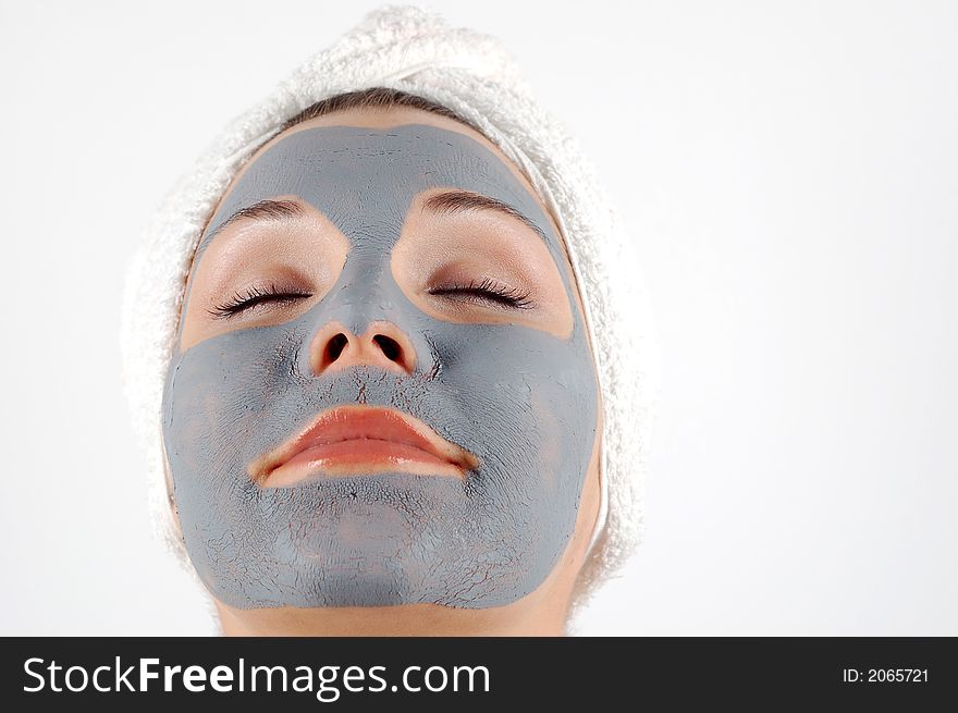 Attractive woman with facial mask. Attractive woman with facial mask