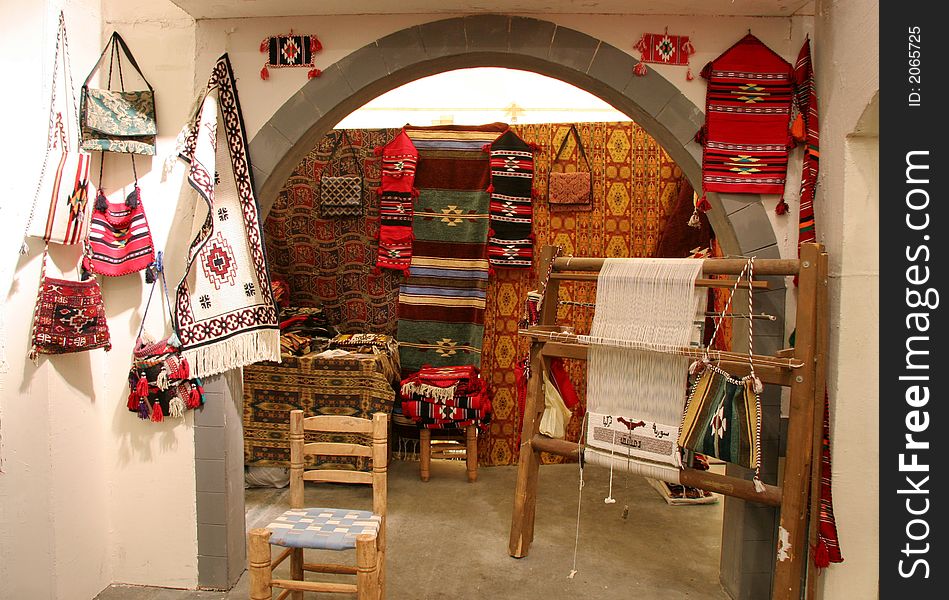 The workplace of a Syrian weaver producing tapestries and handbags. The workplace of a Syrian weaver producing tapestries and handbags.