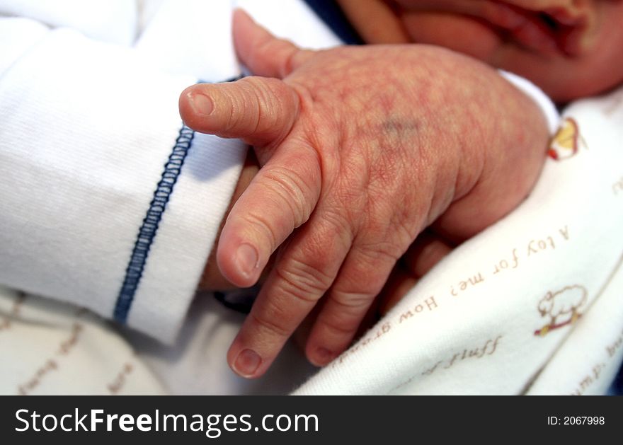 Newborn Baby Boy's Fingers and Hand. Newborn Baby Boy's Fingers and Hand