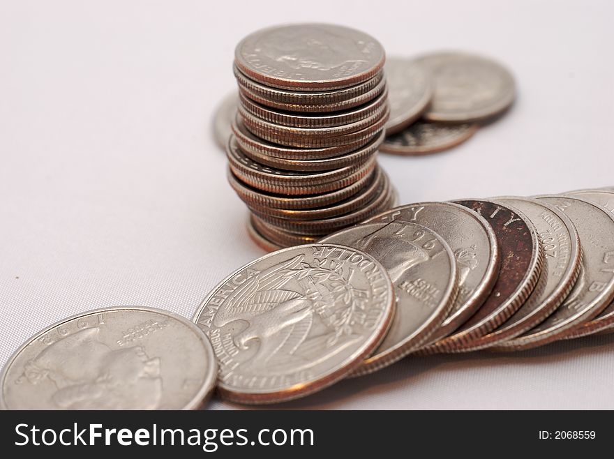 A stack of several different tipe of coins