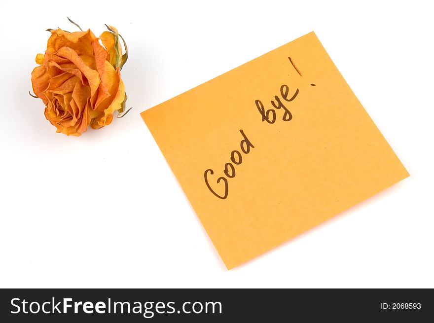 Orange note paper with inscription good bye and rose bud isolated over white