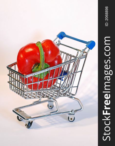 Shopping cart with red pepper