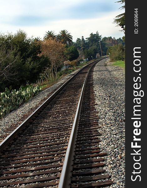 Looking down the railway track to see if something is coming. Looking down the railway track to see if something is coming