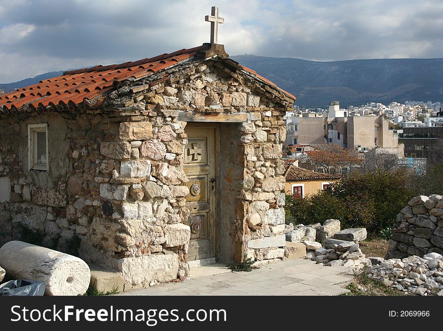 Photo of small shrine at Acropolis in city of Athens (Greece). Photo of small shrine at Acropolis in city of Athens (Greece).