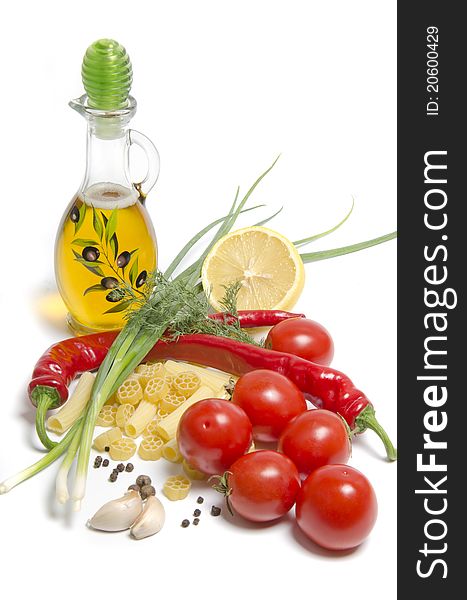 Tomatoes and pasta with spice on white background