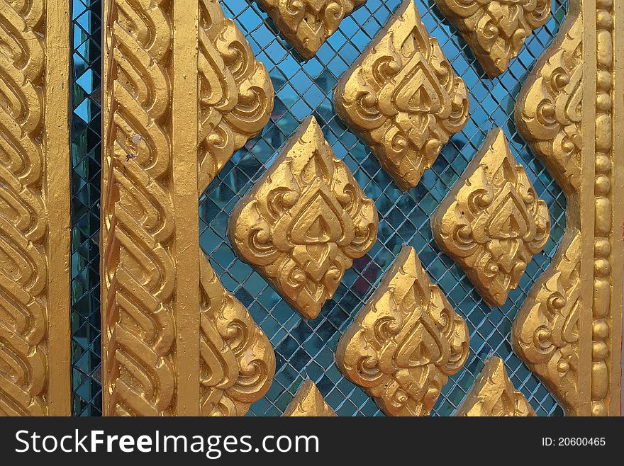 Detailed view of the ornate door of the Thai temple. Detailed view of the ornate door of the Thai temple.