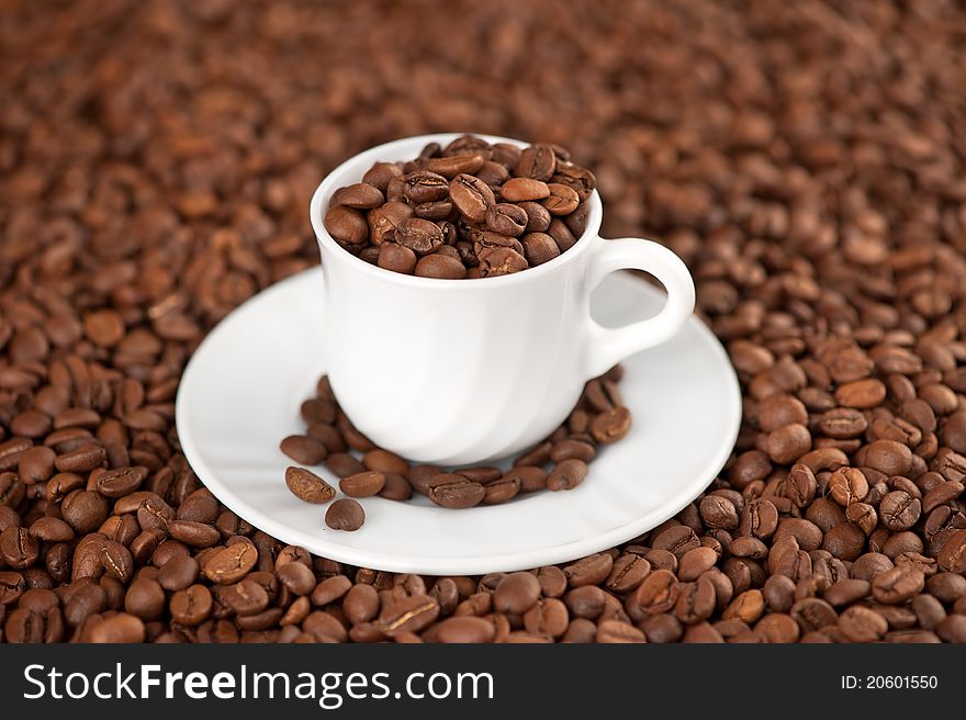 Cup of coffee beans closeup