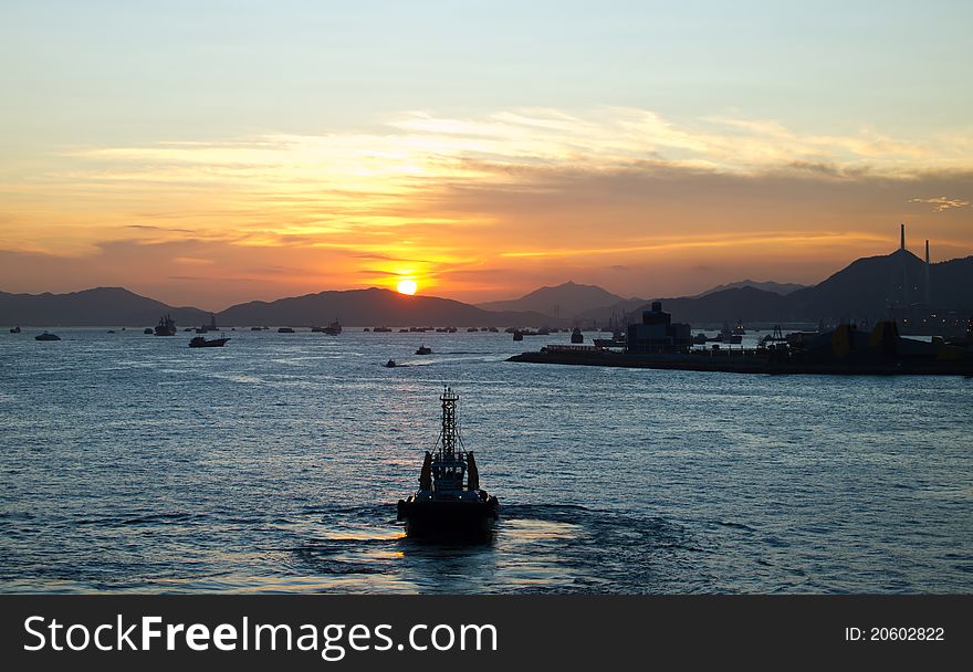 Ships return to pier in sunset. Ships return to pier in sunset