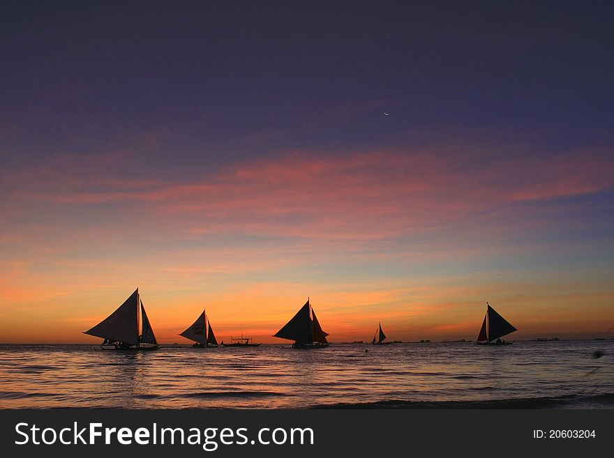 A team of sails in the twilight. A team of sails in the twilight