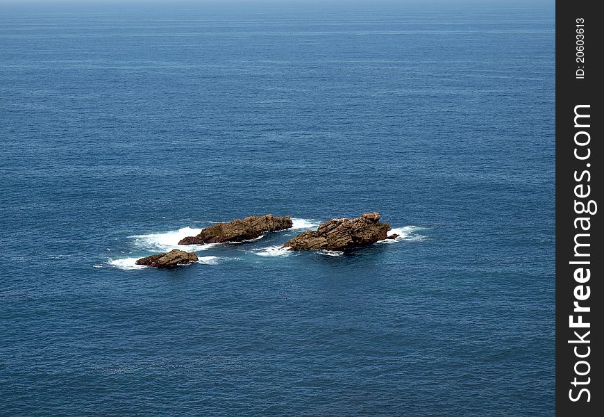 The rocky islet on the northern coast of Spain