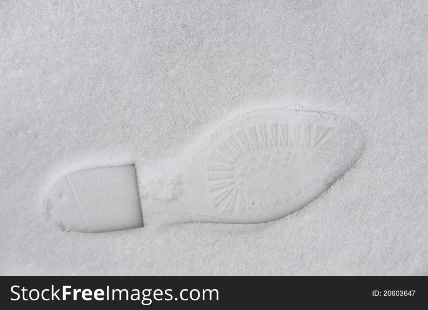 Footprint in the snow, winter concept