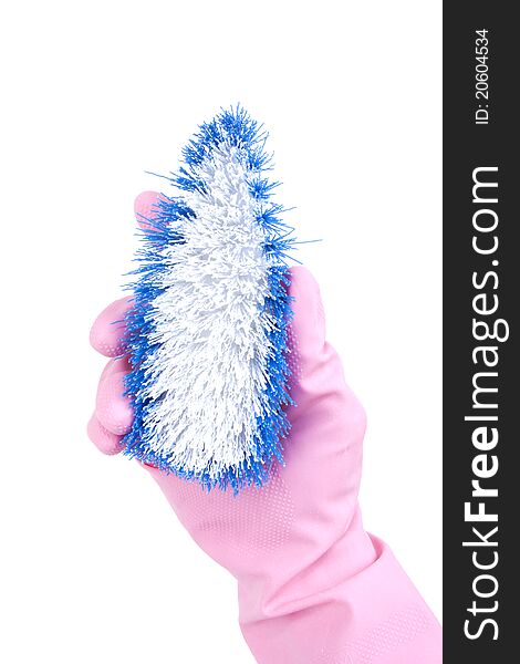 Hand wearing pink rubber glove hold clean brush. Hand wearing pink rubber glove hold clean brush.