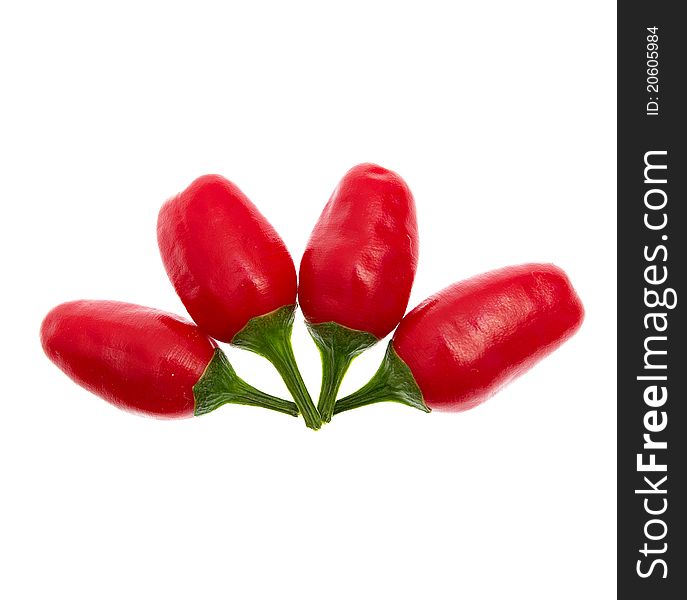 Red hot chilli peppers on white background