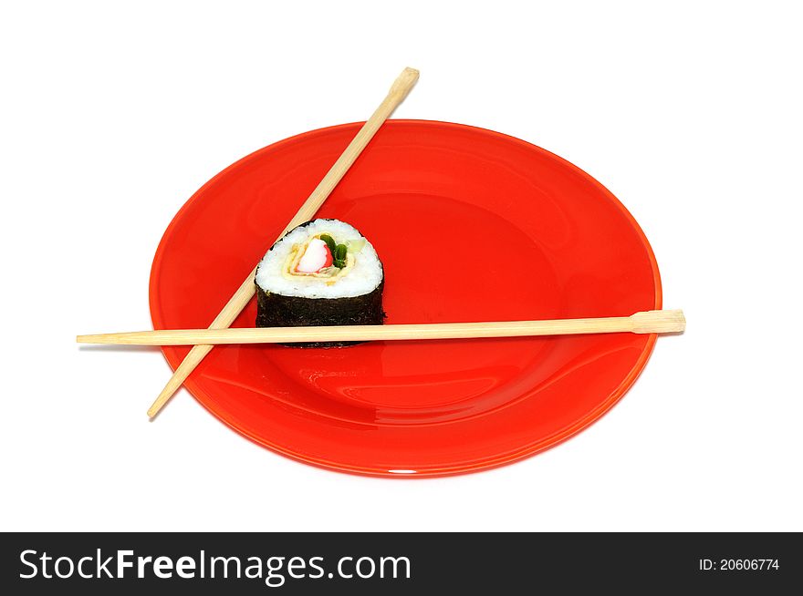 Traditional Japanese sushi on a red plate, isolated on white background. Traditional Japanese sushi on a red plate, isolated on white background