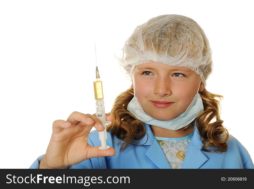 Young doctor playing with injection on a white background. Young doctor playing with injection on a white background