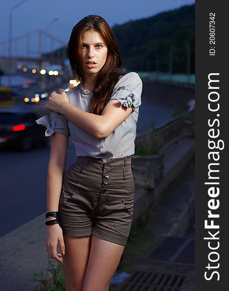 Fashion shoot of young women against the blue sky