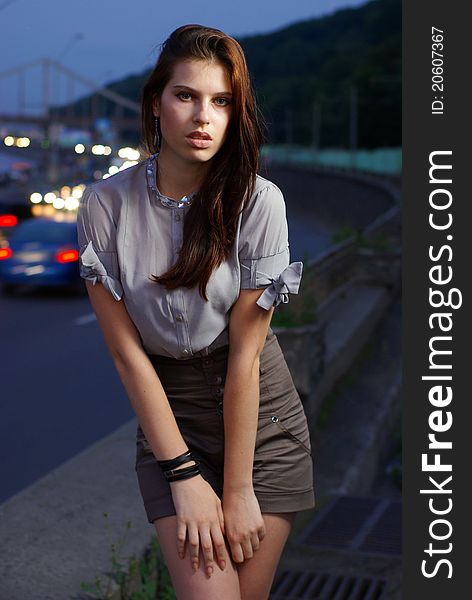 Fashion shoot of young women against the blue sky