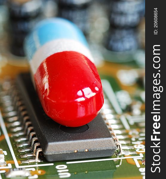 A pill on a computer chip concepts of the health, security, and recovery of the computer