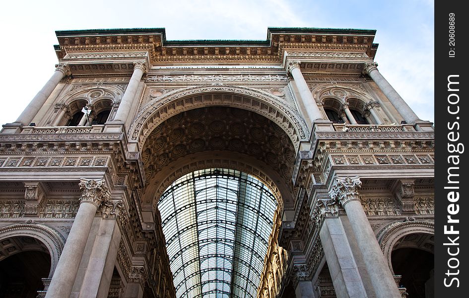 The Galleria Vittorio Emanuele II is a covered double arcade formed of two glass-vaulted arcades at right angles intersecting in an octagon, prominently sited on the northern side of the Piazza del Duomo in Milan. The Galleria Vittorio Emanuele II is a covered double arcade formed of two glass-vaulted arcades at right angles intersecting in an octagon, prominently sited on the northern side of the Piazza del Duomo in Milan.