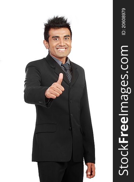 A handsome businessman with thumbs up on an isolated white background