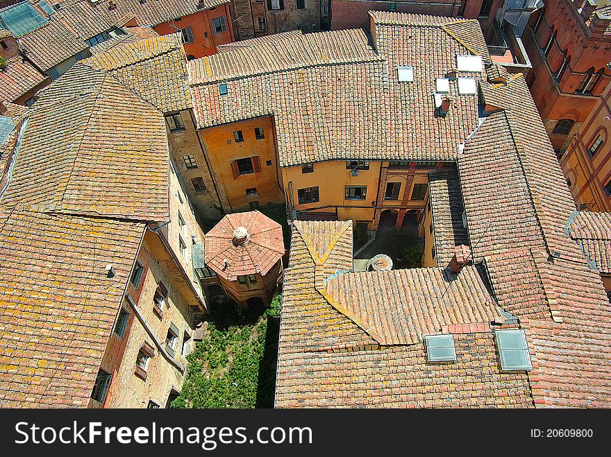 On the photo: Roofs of Siena, Italy